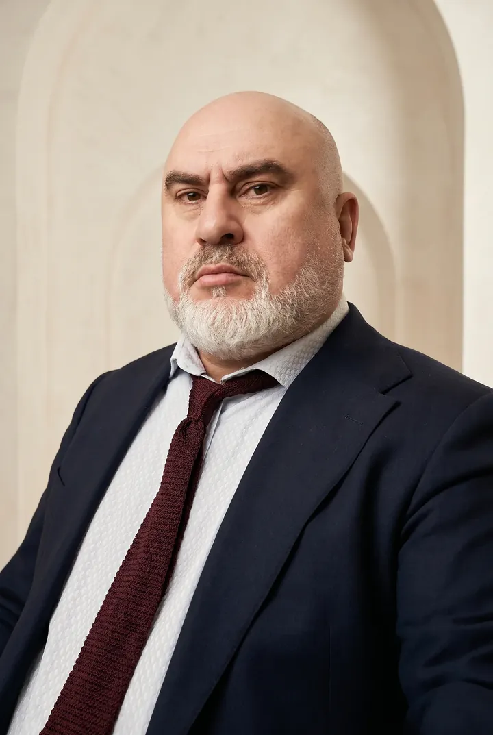 Portrait of Aslan Aydamirov, chairman of the committee
